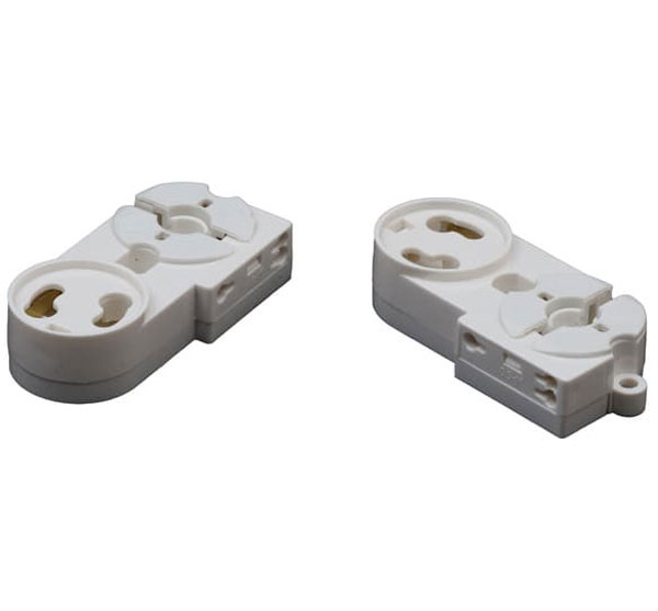 Två vita lysrörshållare G13 med roterbart fäste – för traditionella T8-lysrör i armaturer med skruv- eller fjädermontering.